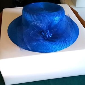 New attack new in box deep blue fancy hat with flour and toole bow embellishment